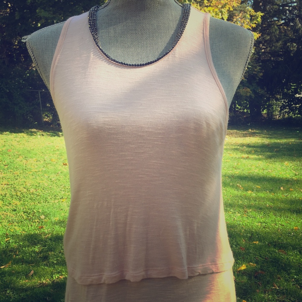 Peach Tank top with jeweled color. Says XS I SAY M